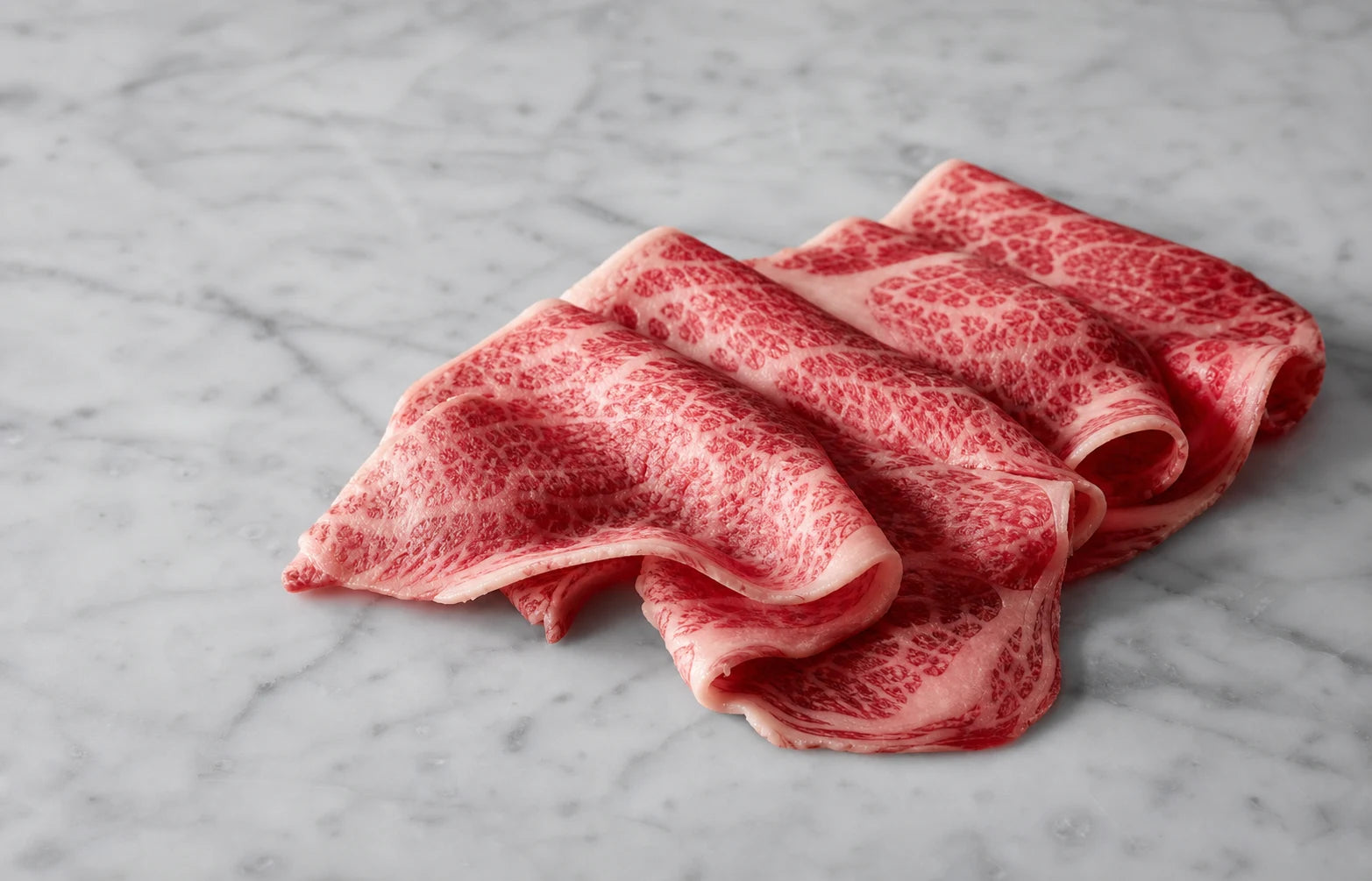 Delicately sliced Wagyu prepared for premium retail presentation