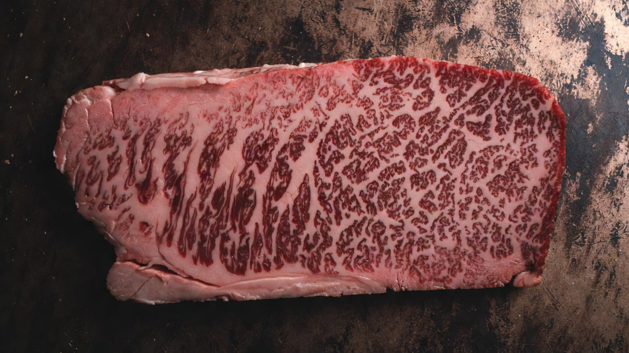 Close detail of Wagyu striploin marbling
